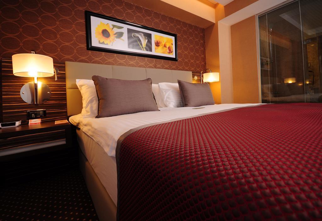 Ramada Plaza By Wyndham Izmit Hotel Kocaeli Ngoại thất bức ảnh A bedroom